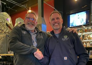 Rob and Ron Shaking Hands